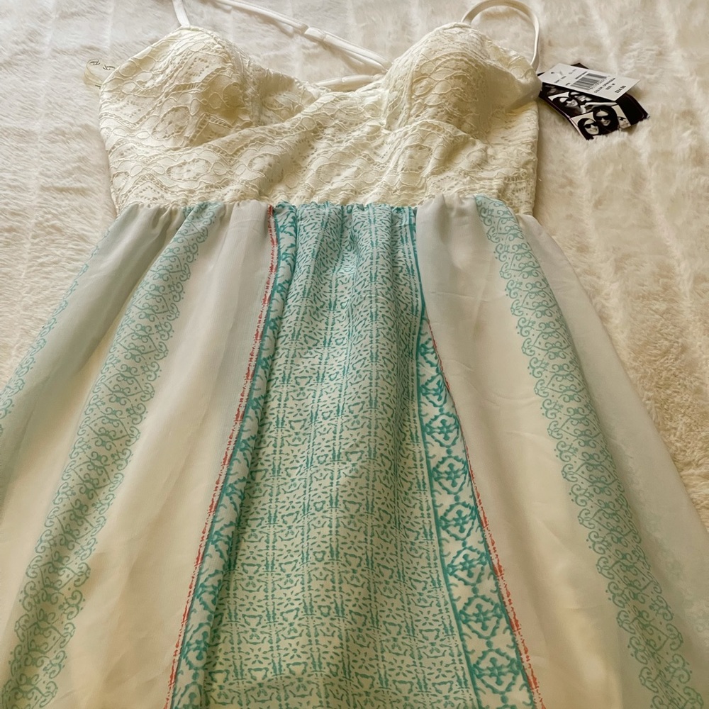 Open back, long long maxi. Never worn.